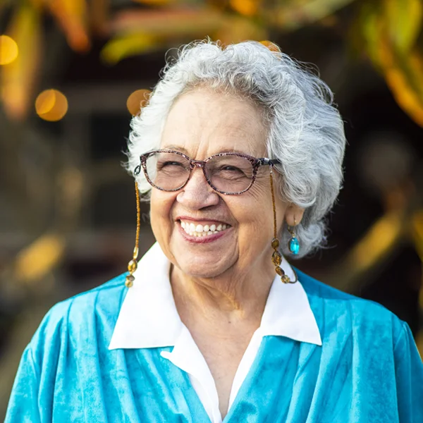 mature woman smiling outdoors