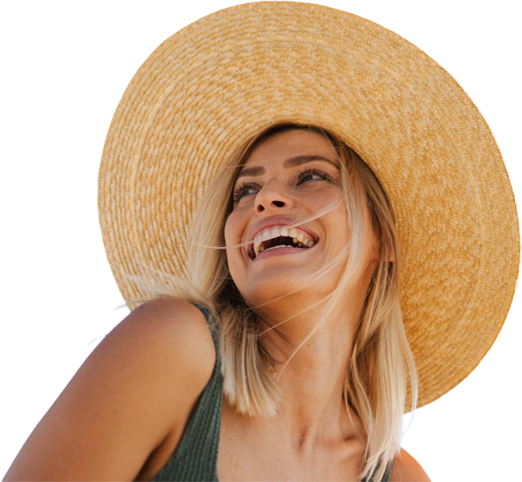 adult woman in a straw sunhat smiling
